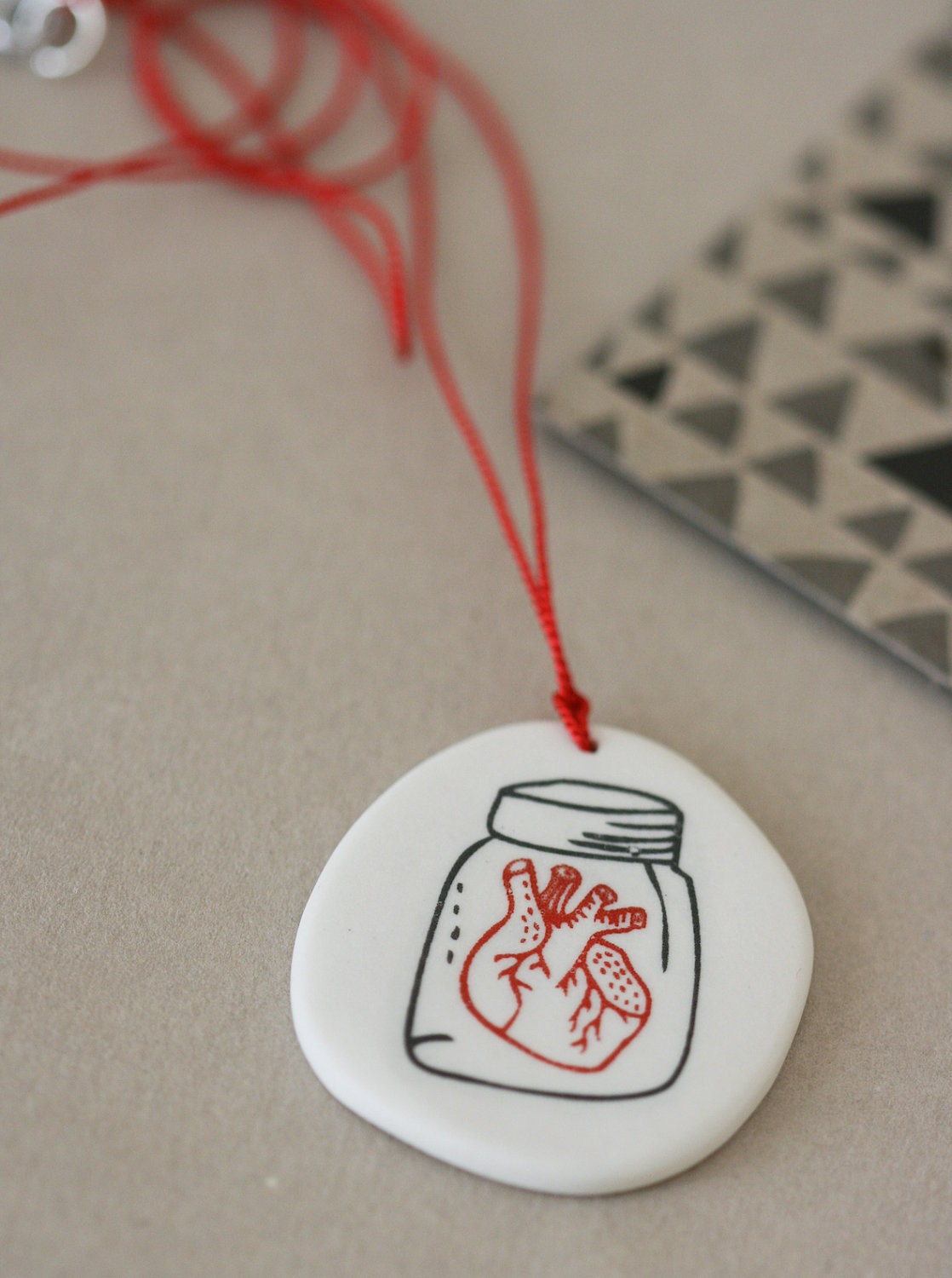 Anatomical heart in jar - porcelain pendant