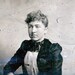 vintage photo tintype Woman w Black Lace Collar Blue eyes