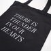thunder in our hearts tote in black
