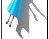 Dorothy - Wake Up - Wizard Of Oz Inspired - Fine Art Digital Pigment Print of Retro, Shiny,Plastic, Doll,Teal, Aqua, Turquoise Dress, Red Ruby, Shoes, Slippers, sun, light, Spooky, Dark Shadows - Photography By Jean Lannen. The Other Jeanie