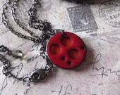 Pierced Enamel Circle Pendant in Red and Orange