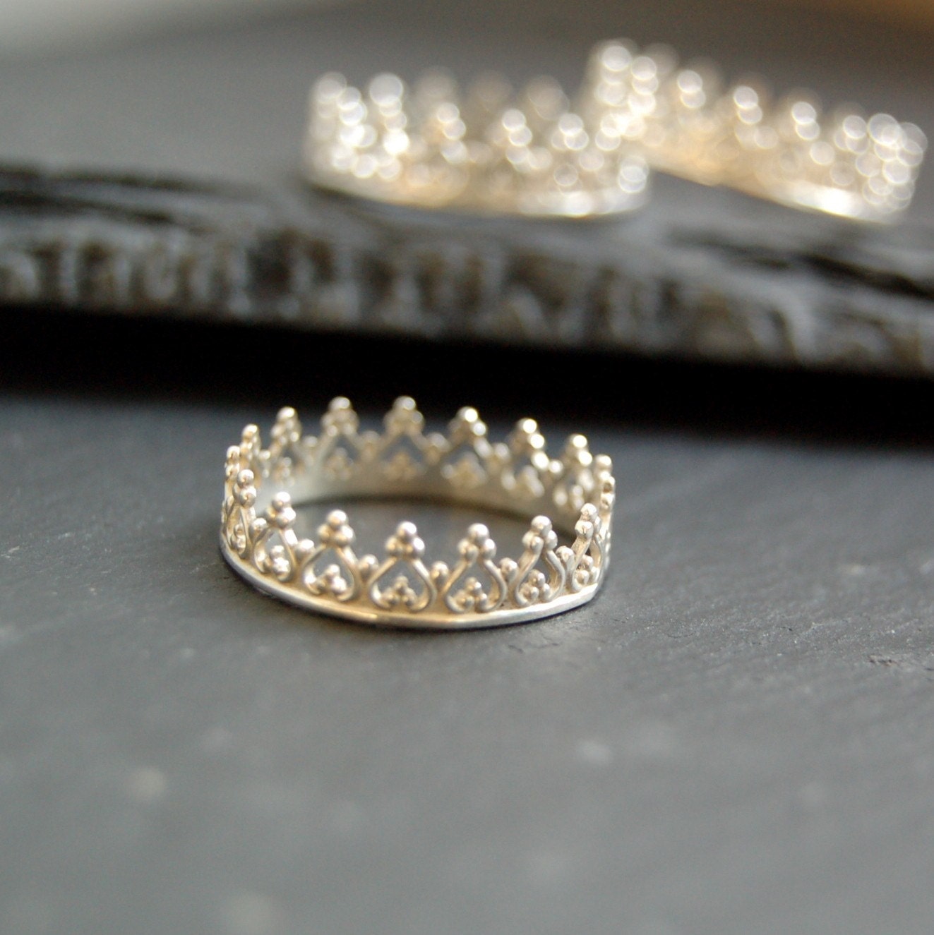 There is no queen without a crown ring, silver band,
