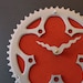 bicycle clock - persimmon