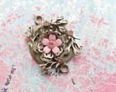 Silver, rhinestones and enamel connector
