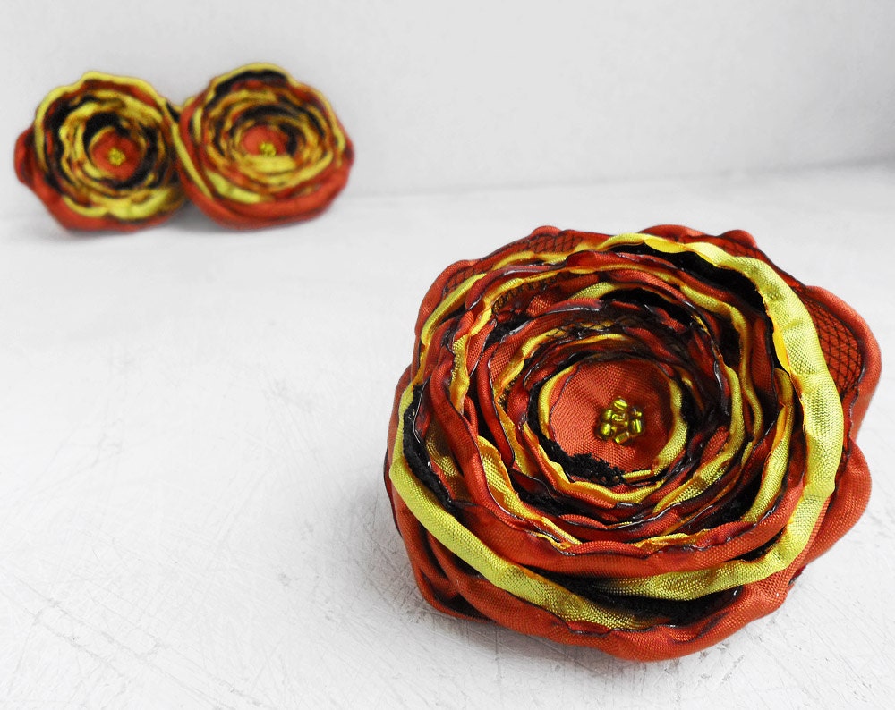 3 Big handmade burnt orange, yellow and black fabric flowers