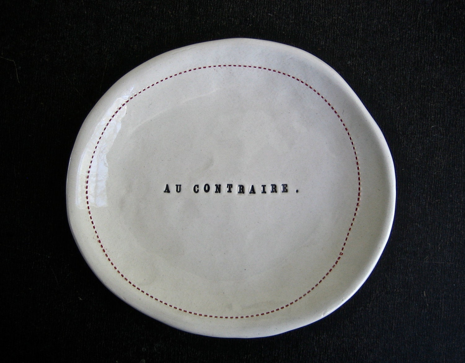 FRENCH red stitch plate (AU CONTRAIRE).