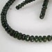 AA Zambian Emerald Faceted Roundels Graduated Strand 4mm - 7mm 12.5 inch length (75 ctw)