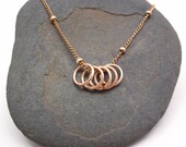 5 Golden rings necklace