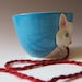 White Cat Yarn Bowl - sculpted kitty against Turquoise Background