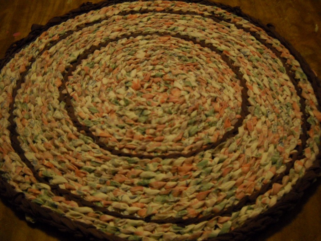 rug 22'' peach, pink, green and purple accent  recycled hand crochet