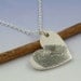 Fingerprint pendant. Your finger print hand engraved onto a sterling silver heart shaped pendant.