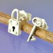 Padlock And Key With Heart Silver Stud Earrings.