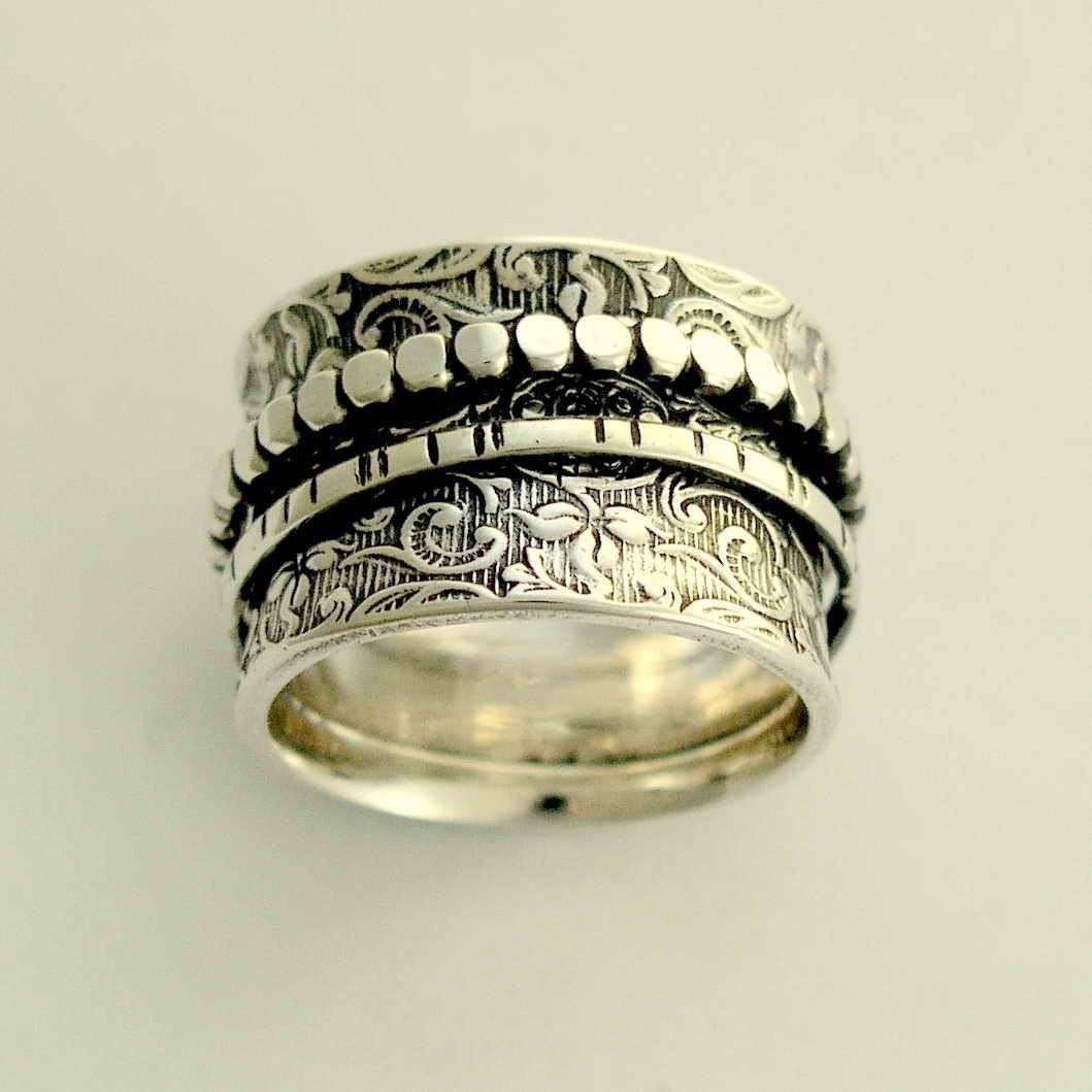 Sterling silver spinners on a filigree wide band - A way of life 2.