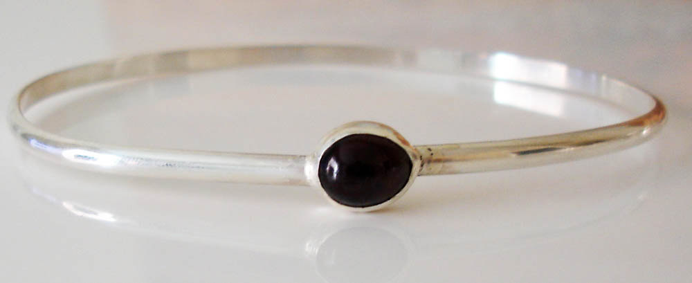 Silver bangle garnet hand made hand forged metalsmith