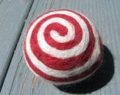 One multi-colored felted pin-cushion, Red and white