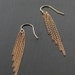 saving grace - dangling gold chain earrings by elephantine