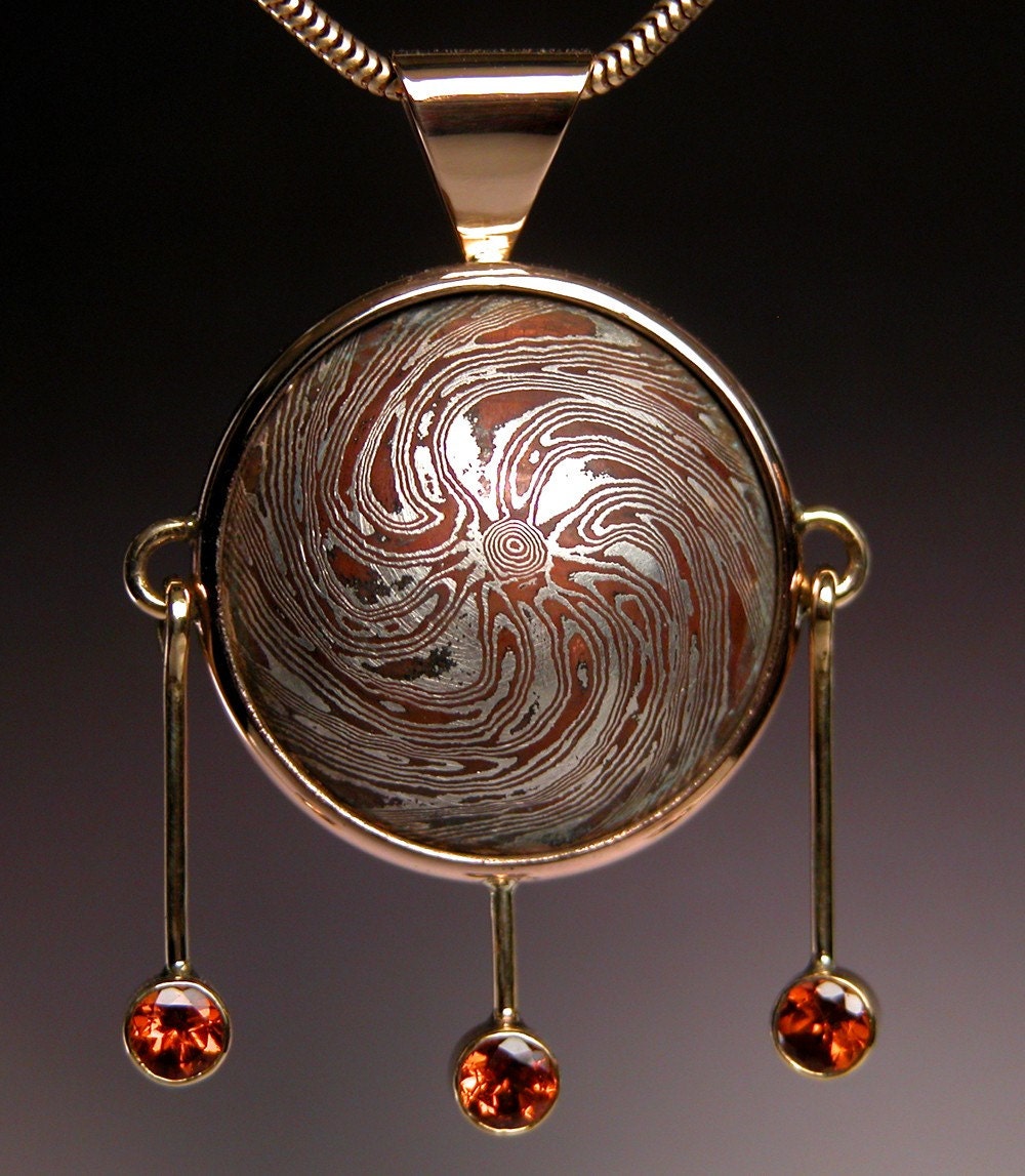 Mokume Gane Pendant in 18 karat Gold with Hessonite Garnets PORTAL
