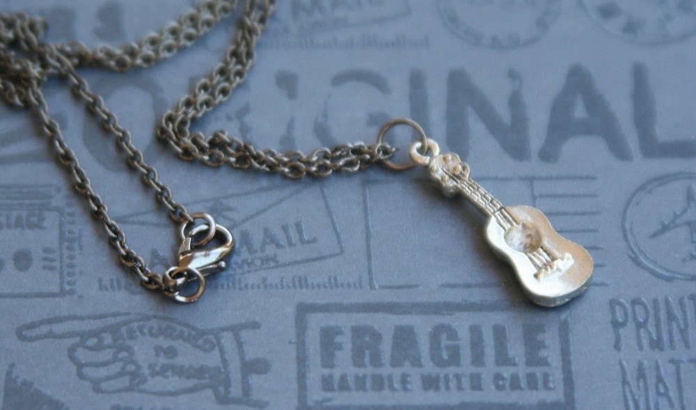 guitar. necklace