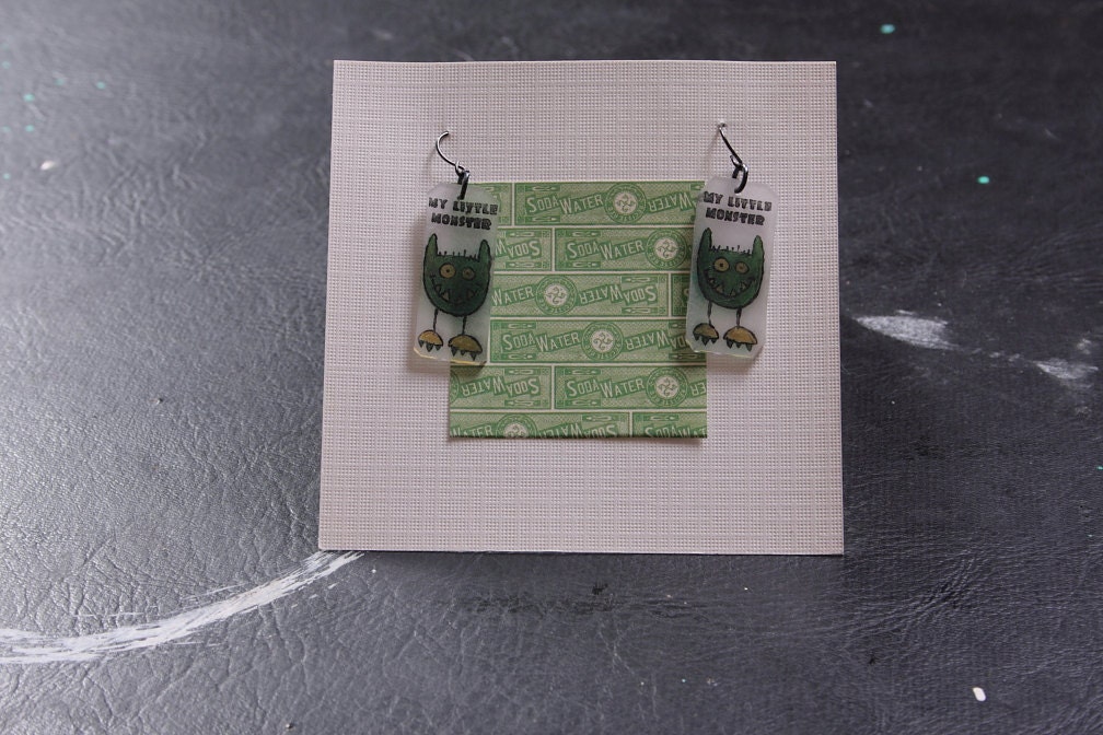 My little Monster. Green with yellow feet. Shrinky Dink Earrings. Super cute. Monsters Inc. themed.