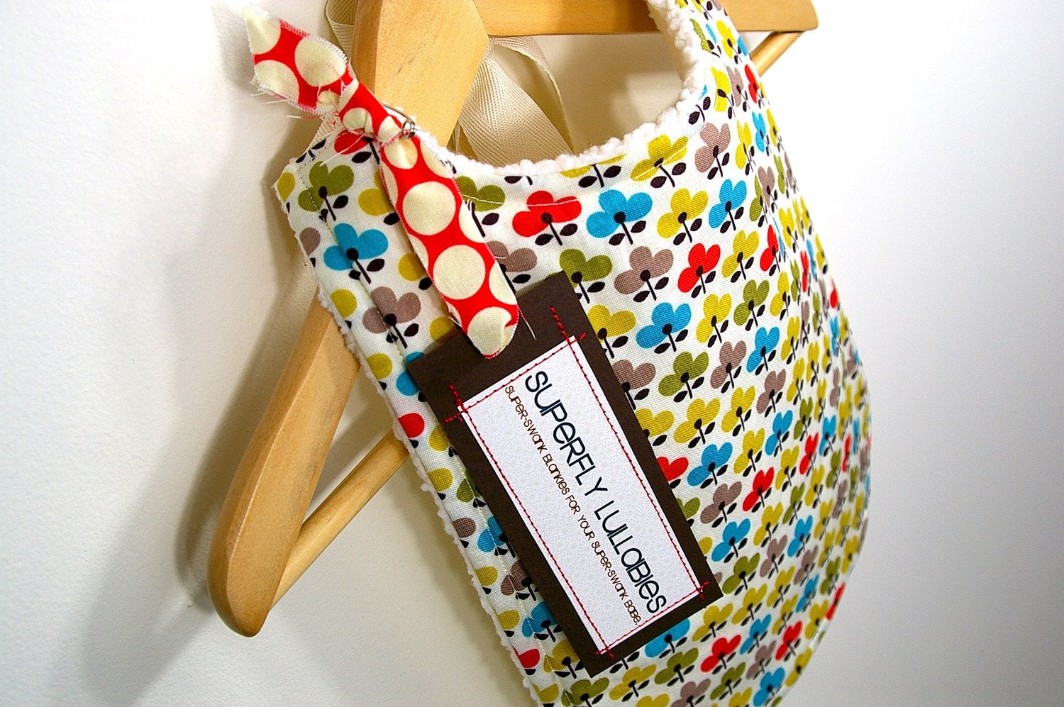multi-colored retro flora patterned bib