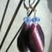 Plum twist glass and crystal earrings