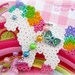 Fairy kei magical rainbow unicorn necklace with blue bow and rainbow and white plastic beaded chain