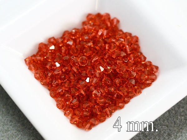 ON SALE 100 pcs. Swarovski Crystal Bicone Padparadscha 4 mm.