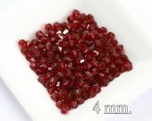 100 pcs. Ruby Swarovski Crystal Bicone 4 mm.