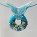 Jewelry Pendant Handmade of Polymer clay in Bagel Shape. Turquoise Beadwork by Artefyk