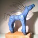 Blue Horse with a Wild Hair standing up at the edge where this moment meets her heart.