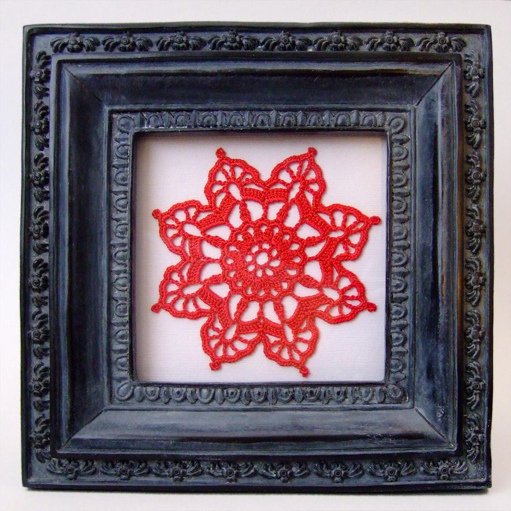 Number 12 Doily under glass
