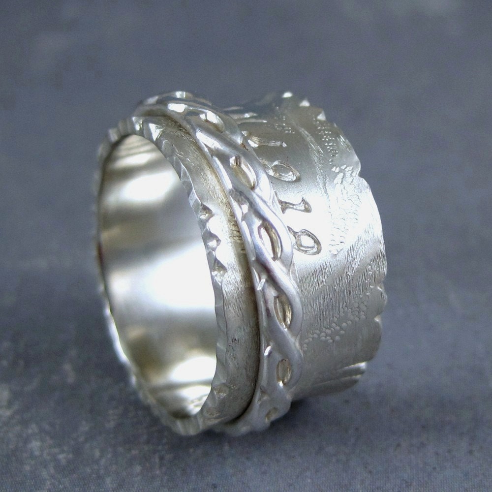 Eternity spinner ring in sterling silver