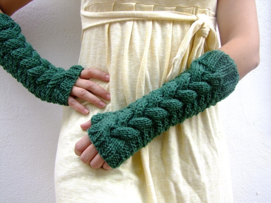Long fingerless gloves , mittens  in green with a cable pattern