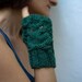 Green fingerless gloves , mittens with an owl pattern