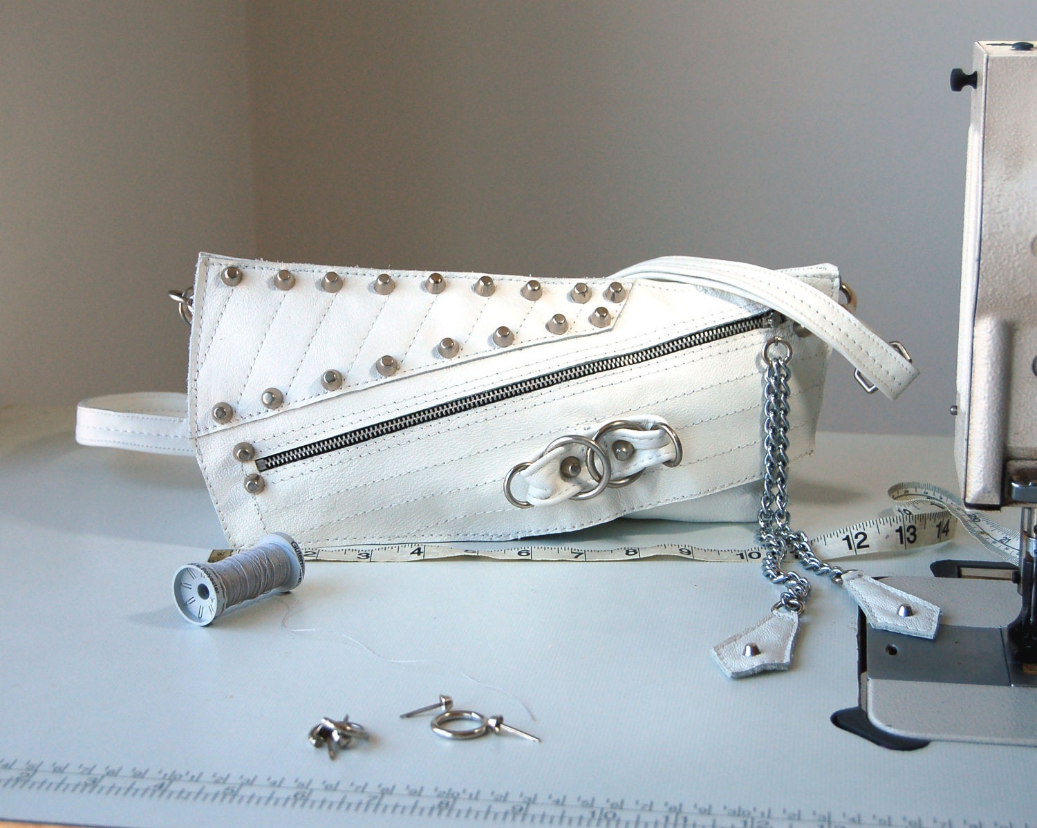 SALE WAS 90. Stella studded white leather biker clutch and shoulder bag.RESERVED.