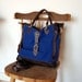 SALE WAS 340. Isaac, antiqued brown leather and blue canvas holdall tote bag.