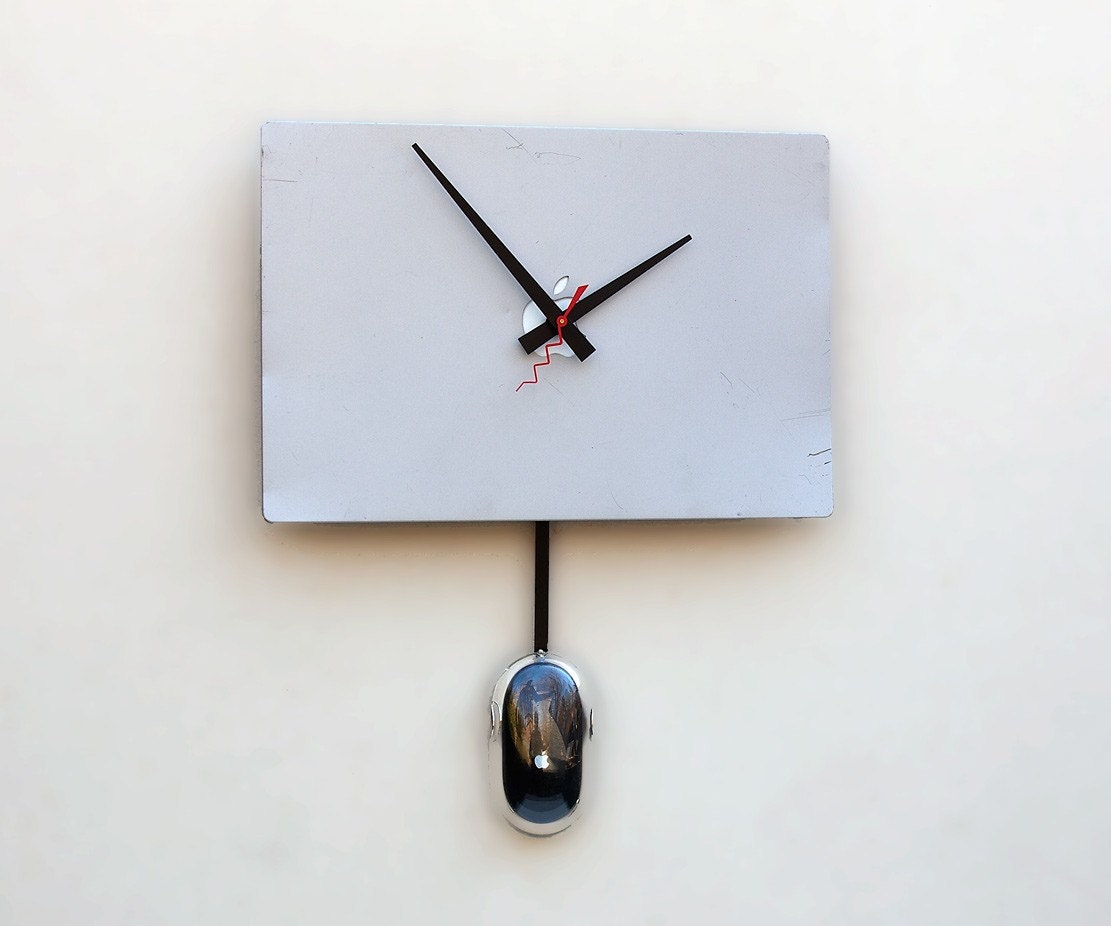 Clock created from a recycled Apple Powerbook laptop cover