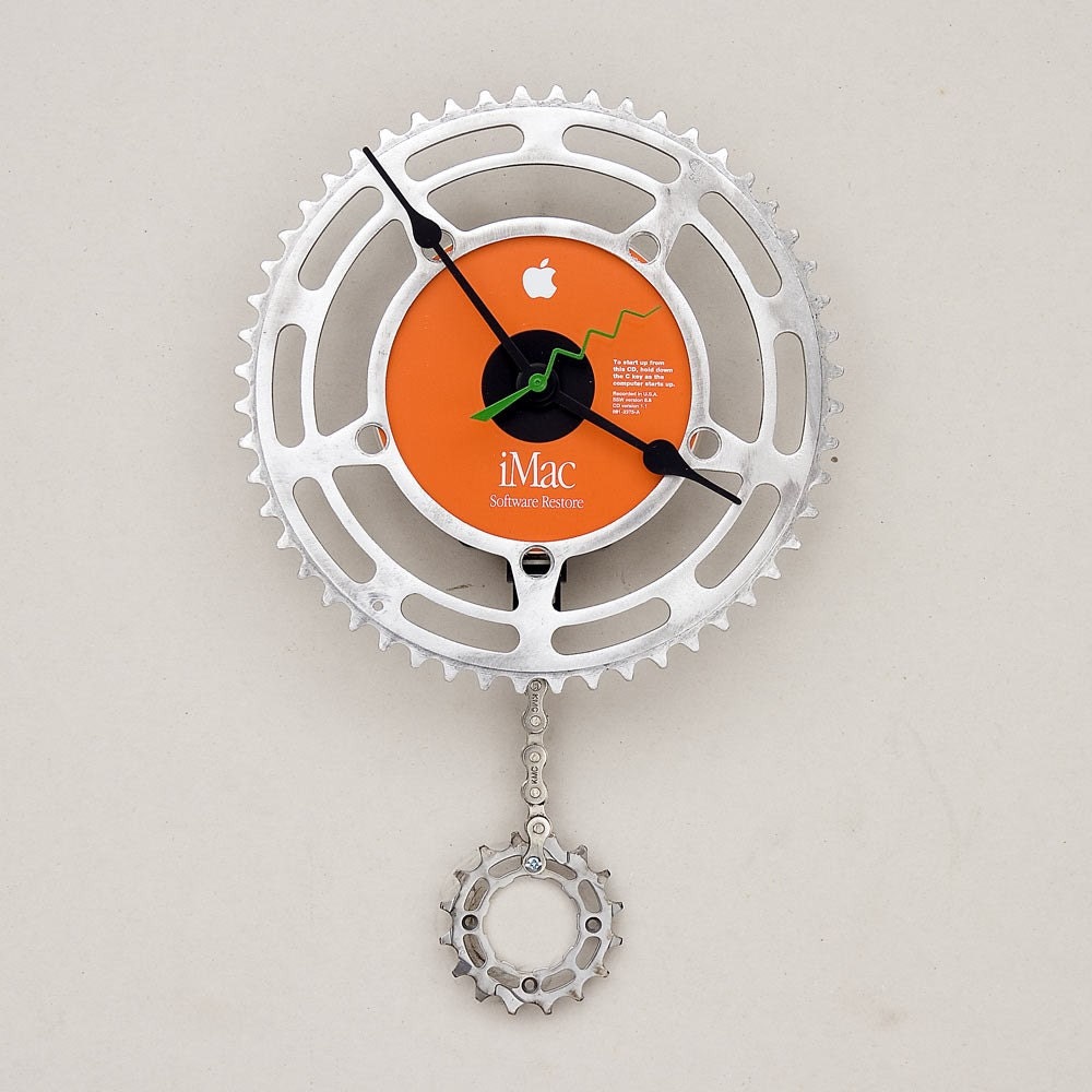 Clock made from a recycled Bike Chain ring and an Apple imac CD restore disk