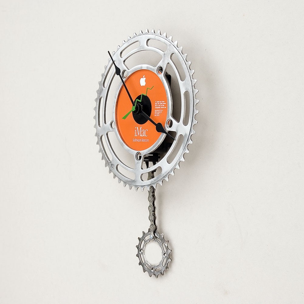 Clock made from a recycled Bike Chain ring and an Apple imac CD restore disk