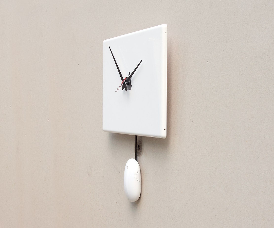 Clock created from a recycled Apple ibook laptop cover