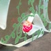 Rosebud Glass Hare Sculpture Green Screen Printed Enamel