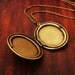 Sparkle and Dance - Large Oval Photo Locket Necklace