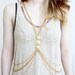 Gold tone Body chain with pyramid stud detail