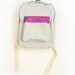 light grey denim backpack with magenta pouch