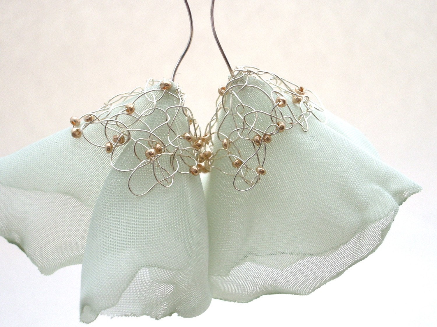 Soft pastel green earrings - Flower Blossoms in fiber and knitted wire - long dangle
