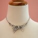 15 DOLLAR SALE - Silver Criss Cross Necklace with Embedded Crystals