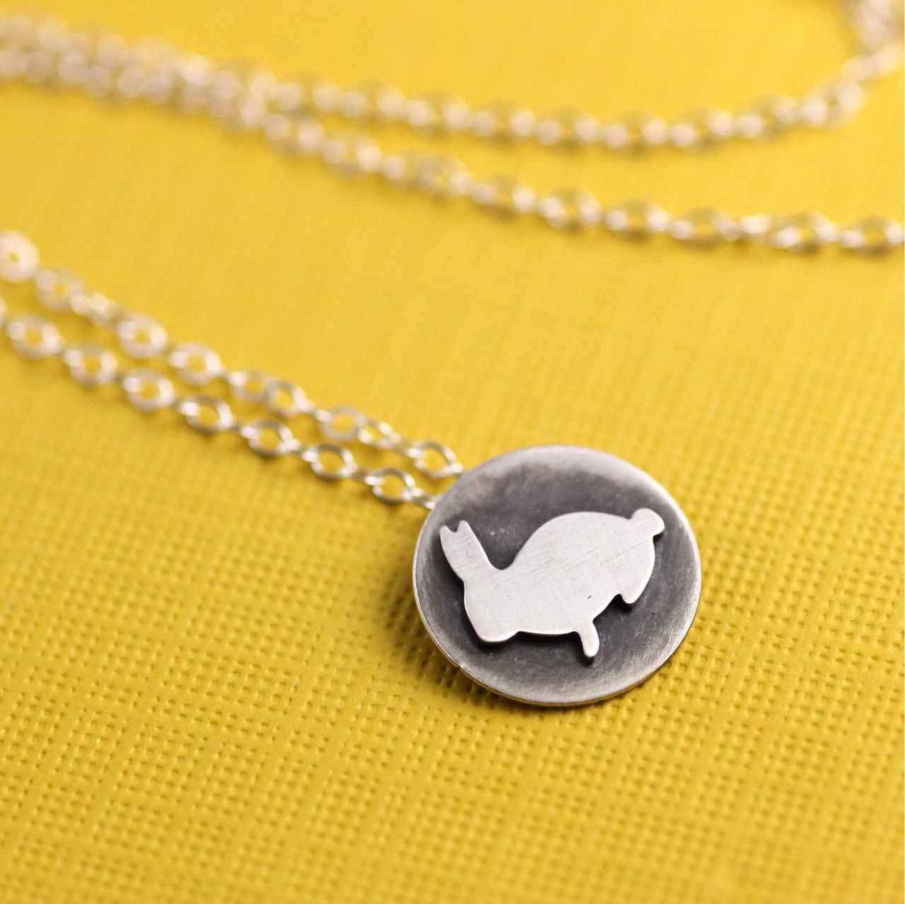 Overstock SALE- WAS: 60.00 NOW 30.00 - Tiny Bunny Token Necklace in Silver