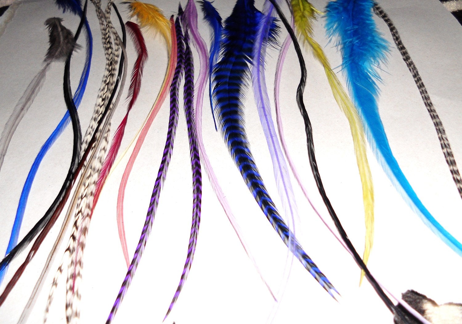 Sky Mix 18 Feathers for hair extensions and 4 crimp beads