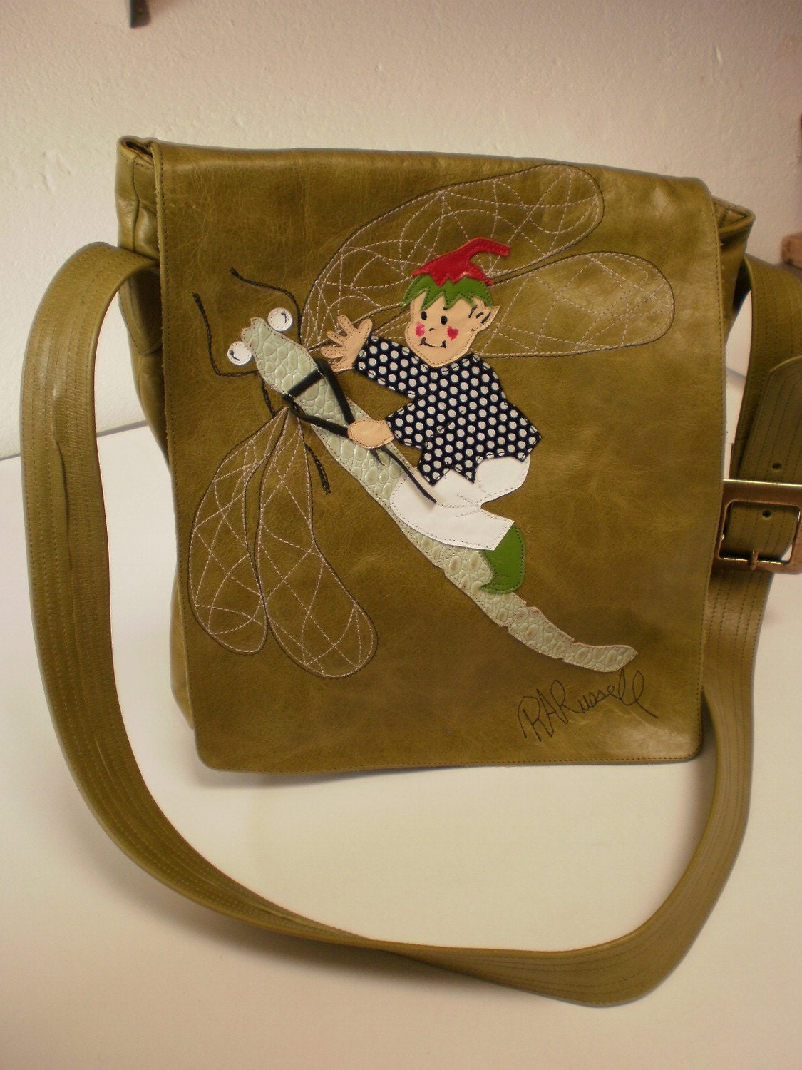 elf riding dragonfly bag