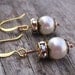 Gold Swarovski earrings